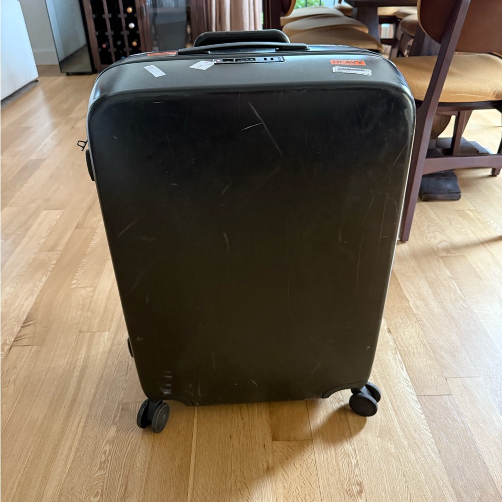 2 Sleek Black Rolling Travel Suitcases 22” & 28”